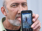 Jeff Ellis of West Linn, Ore., snapped a photo of the scorpion that bit him during an Alaska Airlines flight. Jeff Ellis of West Linn, Ore., snapped a photo of the scorpion that bit him during an Alaska Airlines flight.