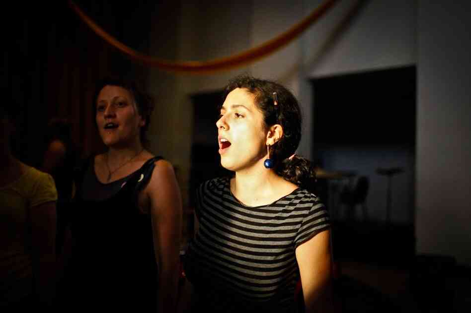 Tatyana Yanishevsky (center) rehearses with the Assembly of Light Choir.