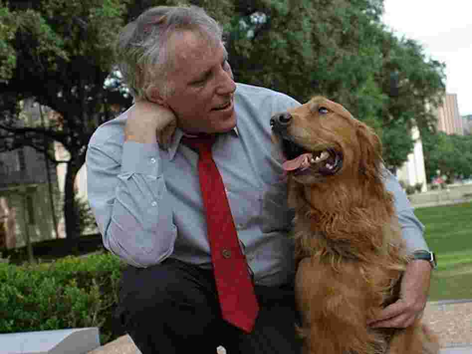 Guide Dogs Acting President Morgan Watkins with his guide dog, Will. Guide Dogs Acting President Morgan Watkins with his guide dog, Will.