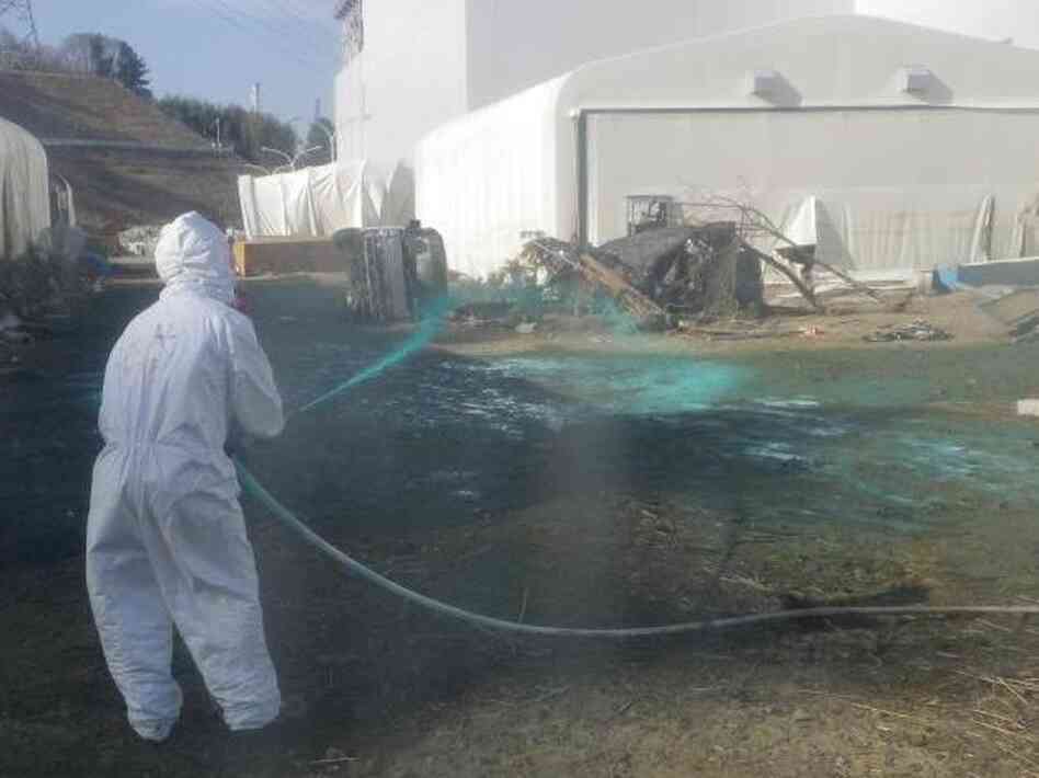 Workers at the Fukushima Dai-ichi nuclear power plant spray a substance to help reduce dust on April 1. Experts say it's likely that workers at the plant could have reduced the severity of the accident if they had made different decisions during the crisis. Workers at the Fukushima Dai-ichi nuclear power plant spray a substance to help reduce dust on April 1. Experts say it's likely that workers at the plant could have reduced the severity of the accident if they had made different decisions during the crisis.