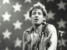 Bruce Springsteen, the NPR audience favorite, plays in front of the flag, circa 1984. Bruce Springsteen, the NPR audience favorite, plays in front of the flag, circa 1984.
