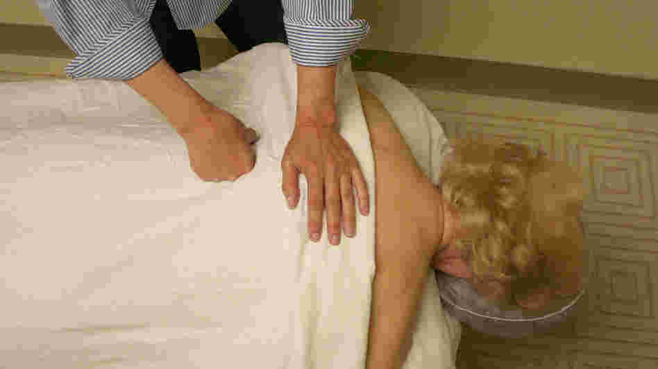 Peggy O'Brien-Murphy receives a massage from therapist Loretta Lanz. O'Brien-Murphy was among the participants in a study that found both relaxation and deep tissue massage are effective treatments for lower back pain.