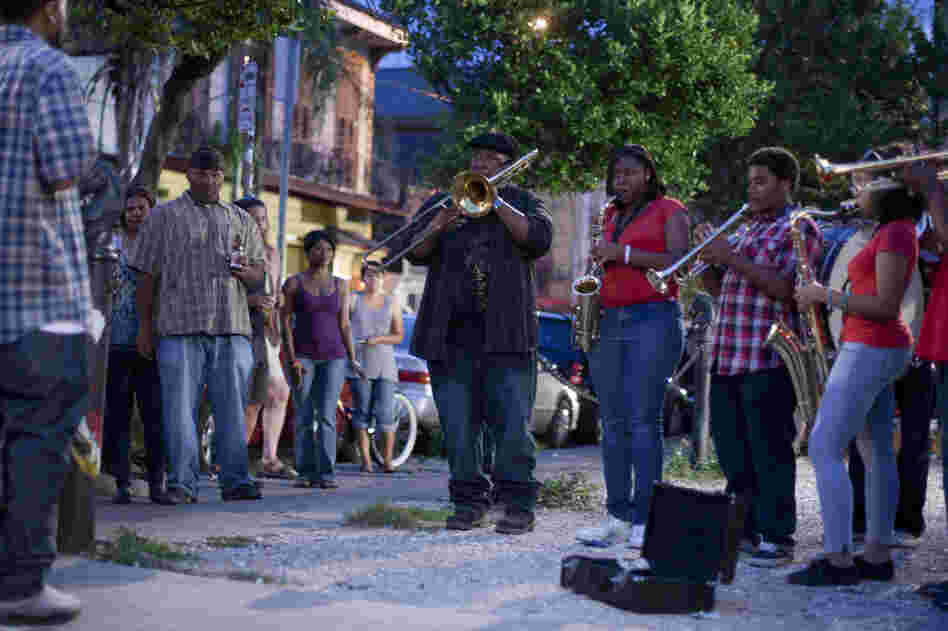 Antoine Batiste (Wendell Pierce) leads his students on a busking adventure in the French Quarter on Treme.