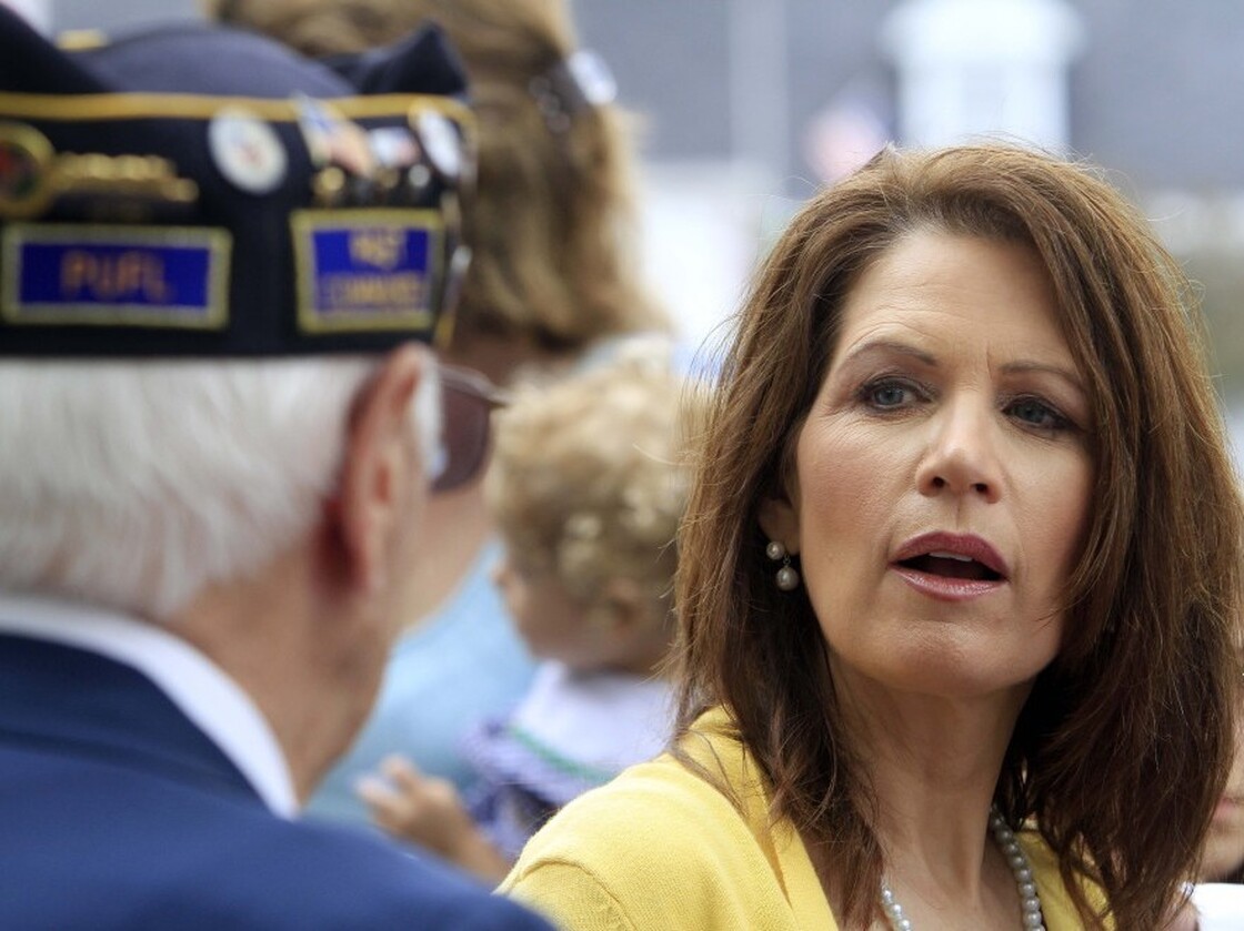Meet And Greet: Rep. Michele Bachmann talks with veterans after marching in a Memorial Day parade in North Hampton, N.H.