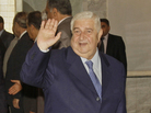 Syrian Foreign Minister Walid Moallem waves to reporters before a meeting with his counterpart from Iraq, in Baghdad on May 31, 2011. Syrian Foreign Minister Walid Moallem waves to reporters before a meeting with his counterpart from Iraq, in Baghdad on May 31, 2011.