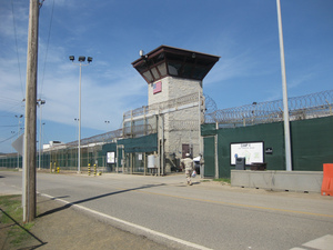 An October 2010 photo reviewed by U.S. military officials shows Camp VI entrance at Guantanamo, where 70 prisoners were detained. An October 2010 photo reviewed by U.S. military officials shows Camp VI entrance at Guantanamo, where 70 prisoners were detained.