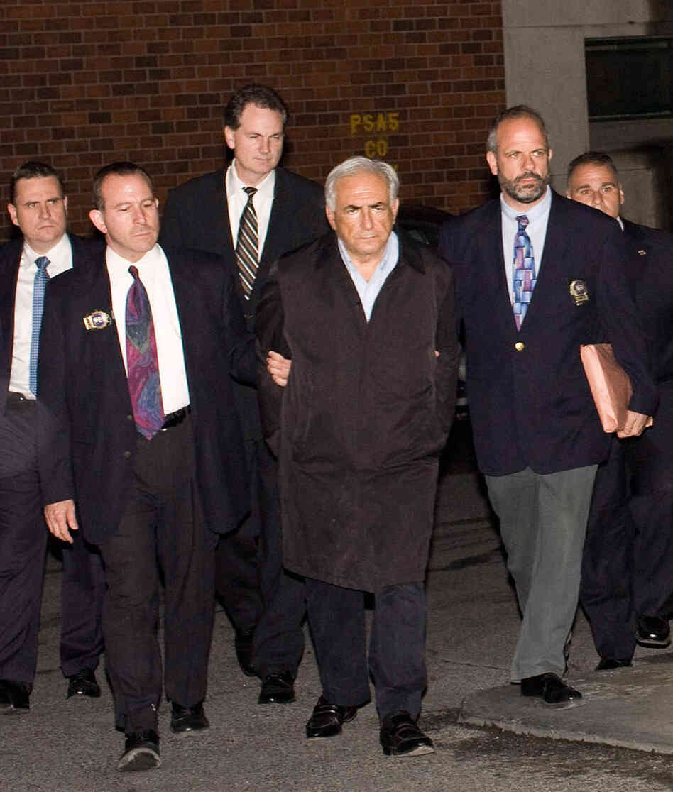 The power of an image: Dominique Strauss-Kahn hardly looks innocent as New York police escort him in handcuffs to a police vehicle on May 15, 2011. The power of an image: Dominique Strauss-Kahn hardly looks innocent as New York police escort him in handcuffs to a police vehicle on May 15, 2011.