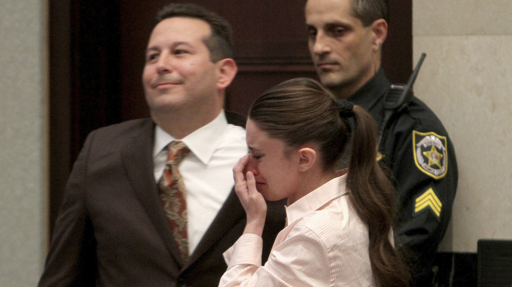 Defense attorney Jose Baez and Casey Anthony hug after the jury acquitted her of murdering her daughter, Caylee, during the trial at the Orange County Courthouse in Orlando, Fla., July 5, 2011.