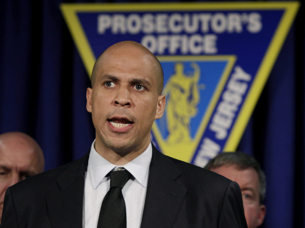 Newark Mayor Cory Booker answers a question during a news conference on May 27, 2011, in Newark, N.J. where the name was announced of the off-duty police officer who was killed in a drive-by shooting at a Newark fast-food restaurant.