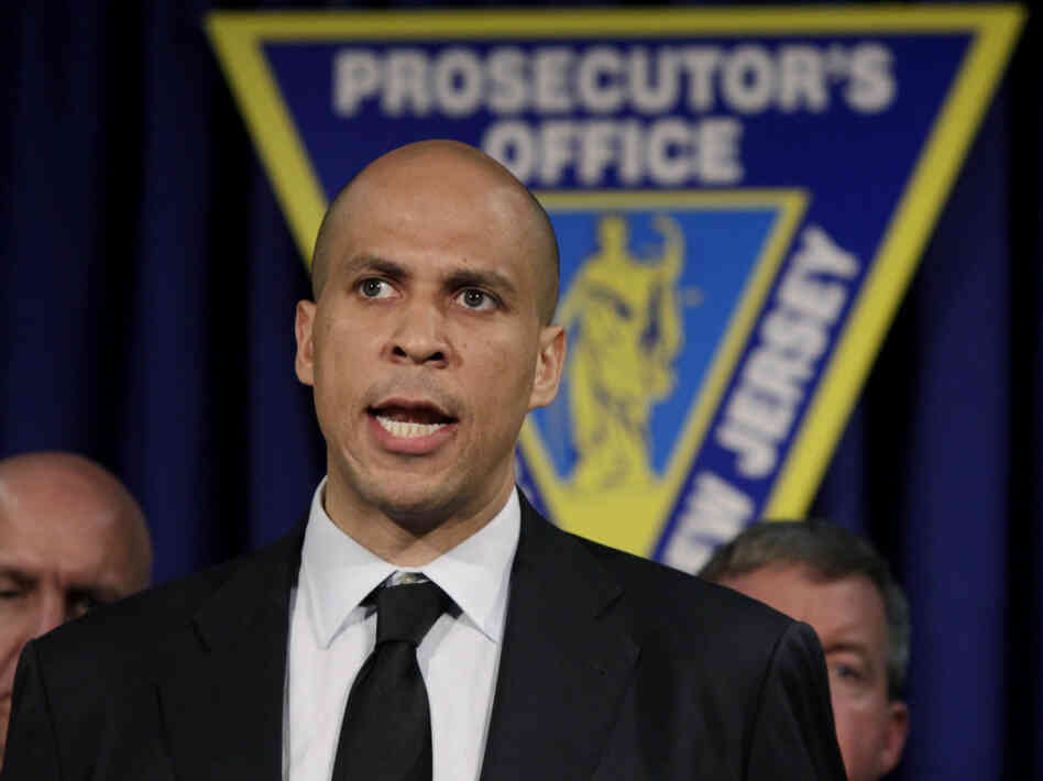 Newark Mayor Cory Booker answers a question during a news conference on May 27, 2011, in Newark, N.J. where the name was announced of the off-duty police officer who was killed in a drive-by shooting at a Newark fast-food restaurant.
