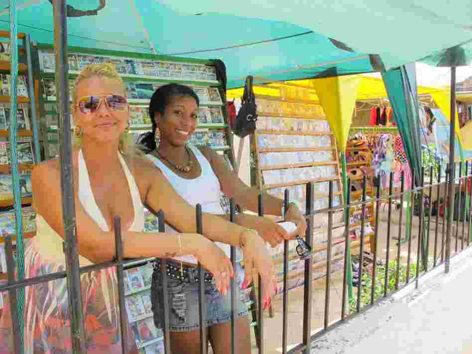 Ivelis Ramos (right) was laid off from her state job as a bookkeeper last year and now runs a makeshift store in Havana's Miramar neighborhood. Restrictions on privately owned businesses are beginning to relax under Raul Castro, Fidel Castro's brother.