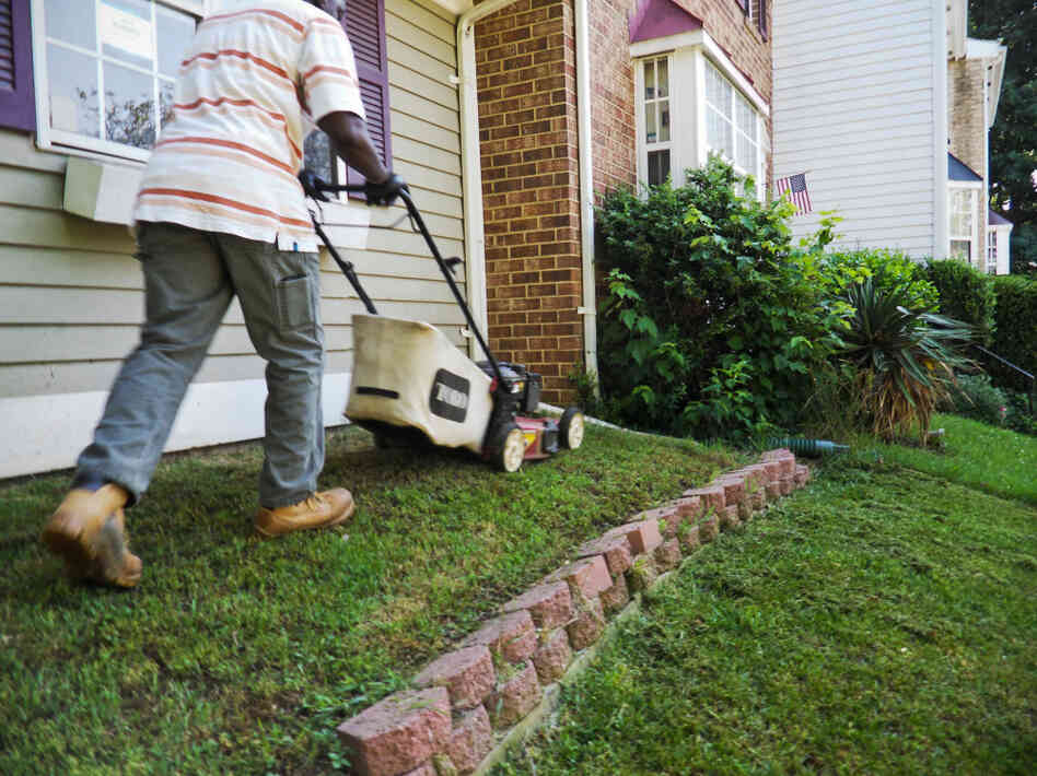 A lawn maintenance worker mows the lawn of a foreclosed Lanham, Md., home. Fannie Mae spends tens of millions of dollars a year just on lawn maintenance for the more than 150,000 foreclosed properties on its books. A lawn maintenance worker mows the lawn of a foreclosed Lanham, Md., home. Fannie Mae spends tens of millions of dollars a year just on lawn maintenance for the more than 150,000 foreclosed properties on its books.