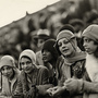 Six African-American women (Howard University students) watch a game in a stadium in the 1920s. Six African-American women (Howard University students) watch a game in a stadium in the 1920s.