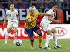 Nilla Fischer of Sweden and America's Abby Wambach battle for the ball during their Group C match in the Women's World Cup. Sweden took an early 1-0 advantage in the match. Nilla Fischer of Sweden and America's Abby Wambach battle for the ball during their Group C match in the Women's World Cup. Sweden took an early 1-0 advantage in the match.
