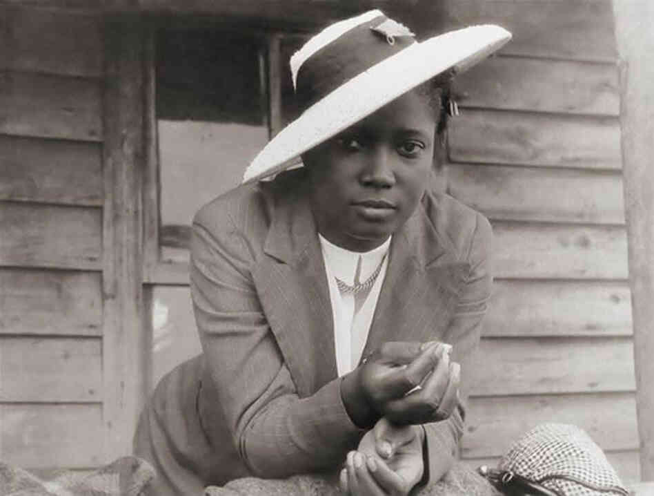 A North Carolina woman waits for a ride to church. "The date of the photograph is 1940, but the tilt of that hat is forever," blog curator Minh-Ha T. Pham writes.