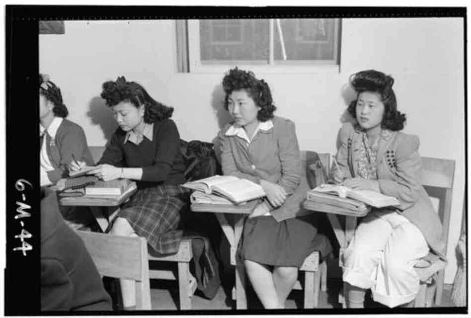 Another Ansel Adams photo shows girls in biology class at the Manzanar internment camp.