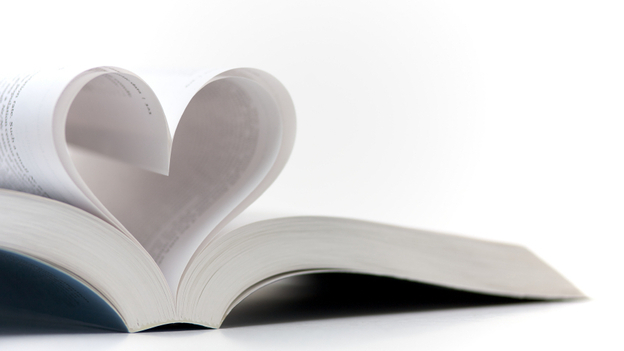 Pages of a book made into a heart shape.