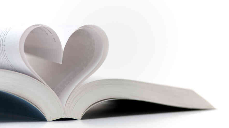 Pages of a book made into a heart shape.