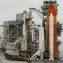 The Rotating Service Structure (L) swings back to reveal the space shuttle Atlantis at Kennedy Space Center, Cape Canaveral, Florida, on July 7, 2011. The U.S. space program has served as a source of inspiration to generations of Americans. The Rotating Service Structure (L) swings back to reveal the space shuttle Atlantis at Kennedy Space Center, Cape Canaveral, Florida, on July 7, 2011. The U.S. space program has served as a source of inspiration to generations of Americans.