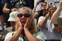 Kennedy Space Center employee Lisa Gorichky cries as Atlantis lifts off. The final flight of the shuttle program, which began in 1981, stirred emotions for many.