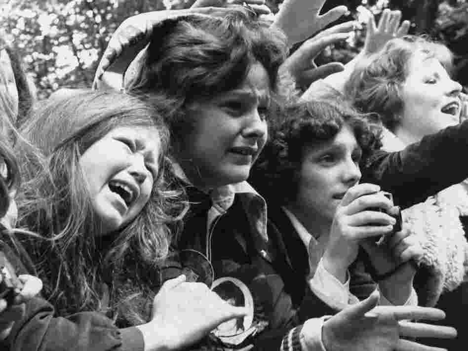 30th May 1975: Over-excited teenage girls scream and cry at the sight of their idols, pop group The Osmonds. (Photo by Evening Standard/Getty Images) 30th May 1975: Over-excited teenage girls scream and cry at the sight of their idols, pop group The Osmonds. (Photo by Evening Standard/Getty Images)