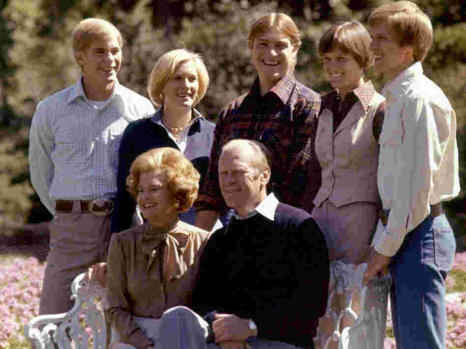 Members of the Ford family pose on the White House grounds in this undated photo. From left, standing: Son Steve; daughter Susan; son Jack; son Michael's wife, Gayle; and Michael. Seated in front: President Gerald and first lady Betty Ford.