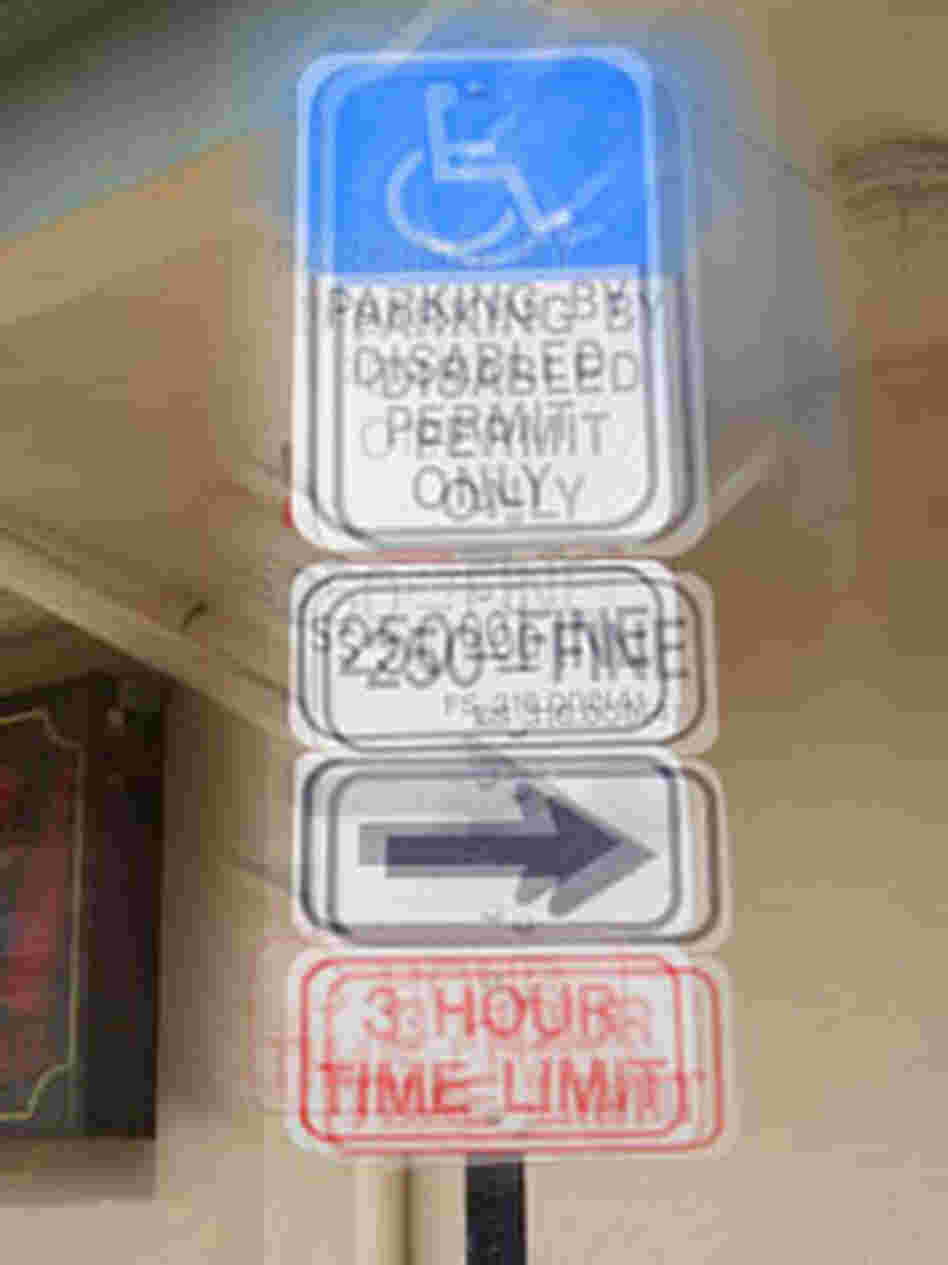 A simulation of what street signs look like to someone with keratoconus. A simulation of what street signs look like to someone with keratoconus.