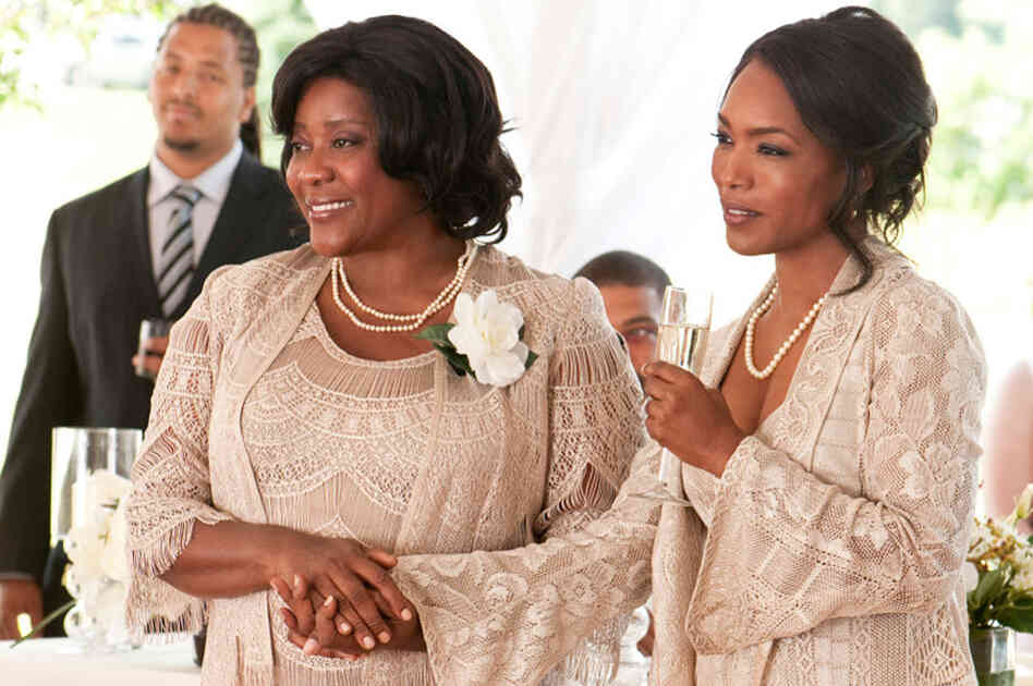 This year, Bassett has had roles in Jumping the Broom (right, with Loretta Devine) and Green Lantern. Credit: Jonathan Wenk/TriStar Pictures