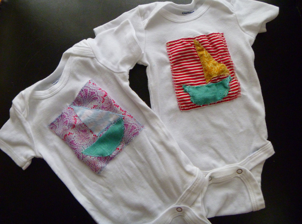 Sailboat onesies made by Emily Grace Whebbe. She is still searching for a name for her soon-to-be-born daughter.