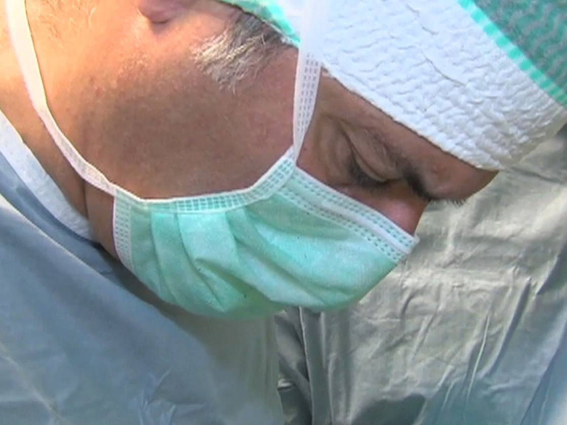 Dr. Paolo Macchiarini, of Karolinska University Hospital, implants a synthetic windpipe.