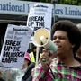 Demonstrators protest outside the headquarters of News International in London on Friday as Prime Minister David Cameron promised inquiries into a phone hacking scandal. Demonstrators protest outside the headquarters of News International in London on Friday as Prime Minister David Cameron promised inquiries into a phone hacking scandal.
