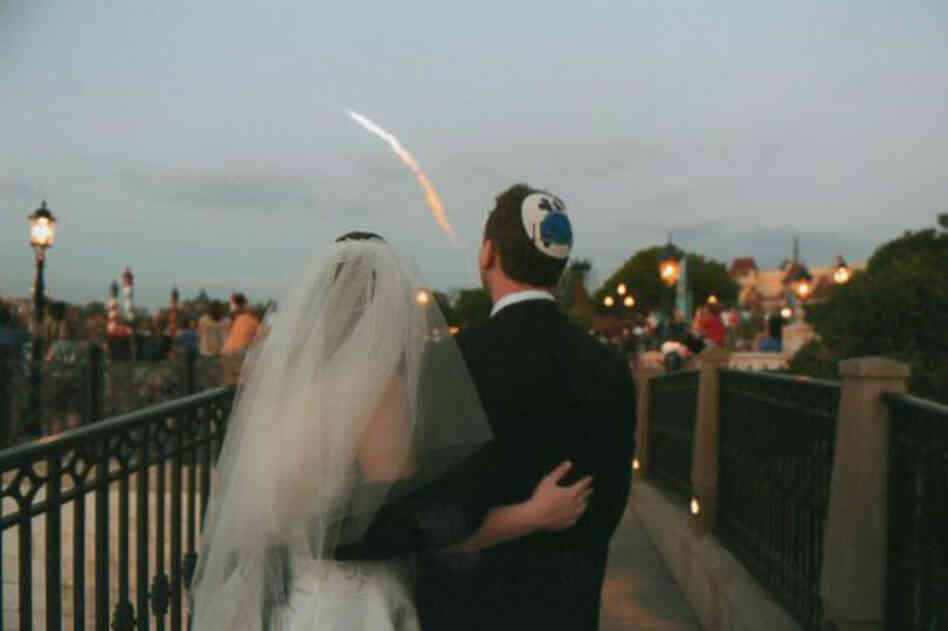 STS-119, Discovery, Mar., 2009"We were married the evening of one of the last night launches from Cape Canaveral. Our wedding was at Walt Disney World, FL and we are standing at the Italy Isola pavilion in EPCOT. Could not have been a more beautiful evening — better than fireworks!" (Courtesy of Jess Lubetsky)NOTE: Captions accompanying photos in this presentation have been edited for cl...
