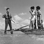 Two armed American border guards confront a group of immigrants attempting to cross illegally from Mexico into the United States in 1948. In A Line in the Sand, Rachel St. John traces the history of the U.S.-Mexico border.