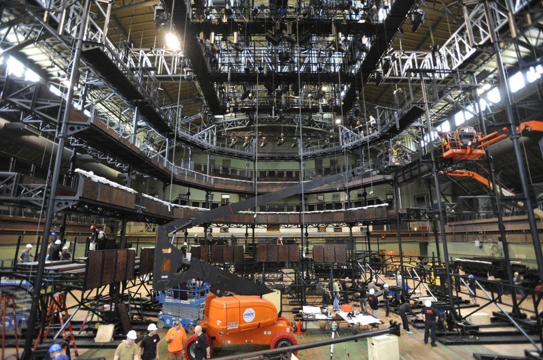 Inside the Park Avenue Armory in New York City, a construction crew assembles a replica — moved to New York in 46 shipping containers — of the Royal Shakespeare Company's main theater in Stratford-Upon-Avon.