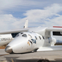 In the future, people will be carried into space by private-sector projects like the Virgin Galactic VSS Enterprise, says former astronaut Jeffrey Hoffman. Here, the Enterprise sits behind Virgin boss Richard Branson, left, and New Mexico Gov. Bill Richardson.