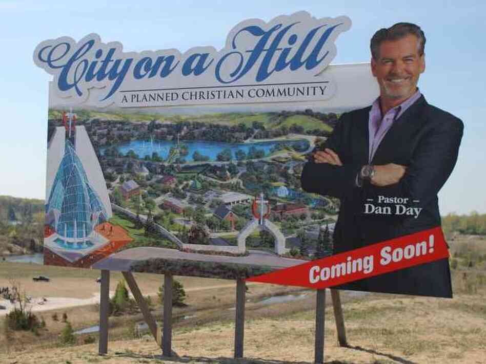 With accent fluctuating, Pierce Brosnan plays Pastor Dan Day of the Church of the Third Millenium, who plans to build his own Christian community out in the desert.