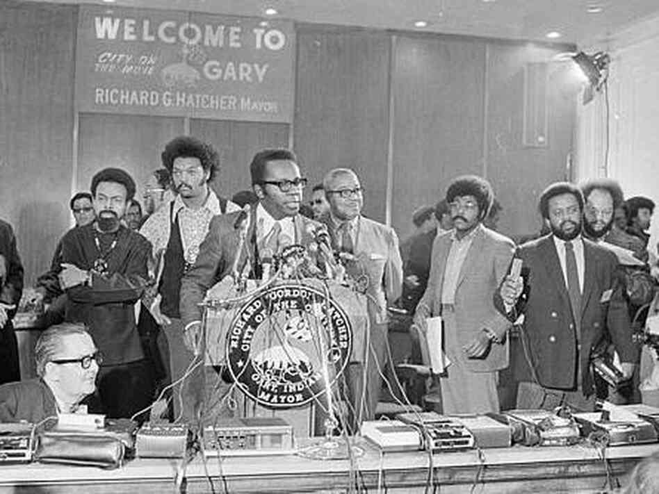 Mayor Richard Hatcher of Gary, Ind., addresses the press at the opening of the National Black Political Convention, March 10, 1972. Rev. Jesse Jackson is second from left. Mayor Richard Hatcher of Gary, Ind., addresses the press at the opening of the National Black Political Convention, March 10, 1972. Rev. Jesse Jackson is second from left.