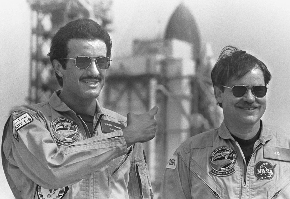 Saudi Prince Sultan Bin Salman Bin Abdulaziz Al-Saud (left) with shuttle pilot John O. Creighton in 1985 before his historic mission.