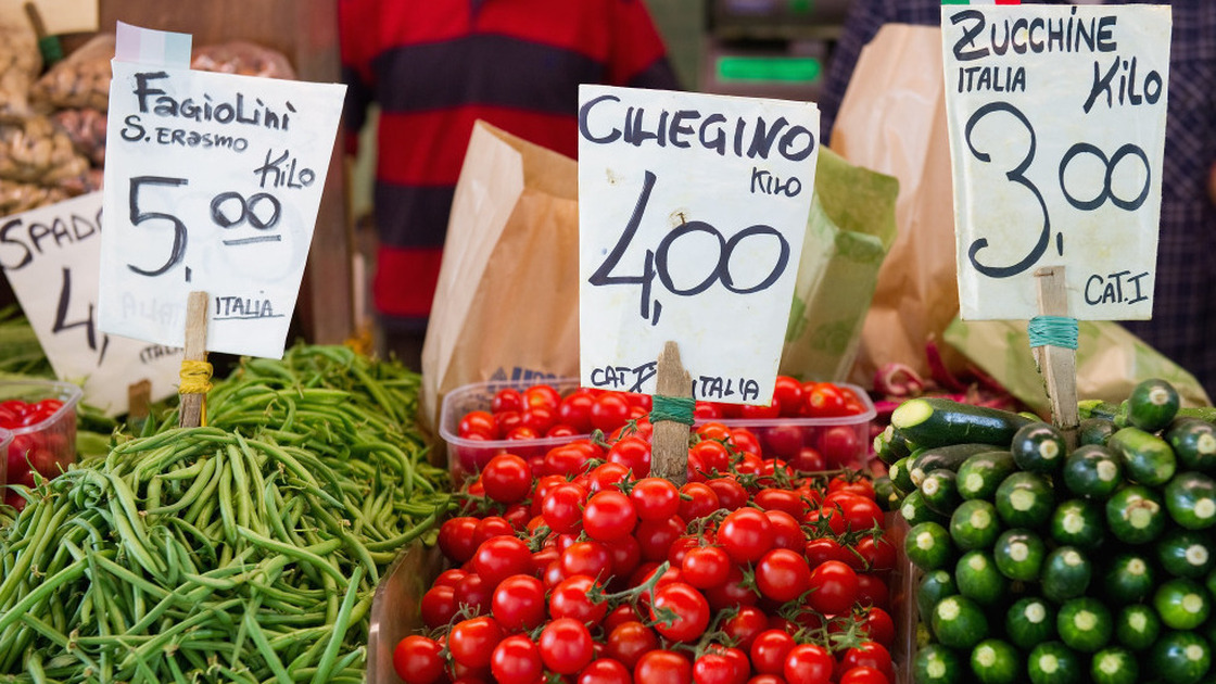 Even in Italy, healthy peasant fare like the fresh vegetables and fruits at this market stall in Venice isn't cheap, leading many there to abandon the famously healthy Mediterranean diet.