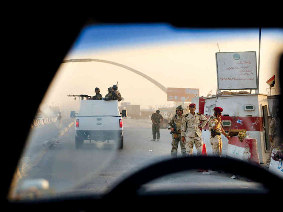 Baghdad's traffic, choked by hundreds of checkpoints, slows to a crawl while security forces inspect vehicles for weapons and explosives. Baghdad's traffic, choked by hundreds of checkpoints, slows to a crawl while security forces inspect vehicles for weapons and explosives.