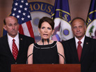 Rep. Michele Bachmann speaks while fellow Republicans representatives Louie Gohmert of Texas (l) and Steve King of Iowa wait. Rep. Michele Bachmann speaks while fellow Republicans representatives Louie Gohmert of Texas (l) and Steve King of Iowa wait.