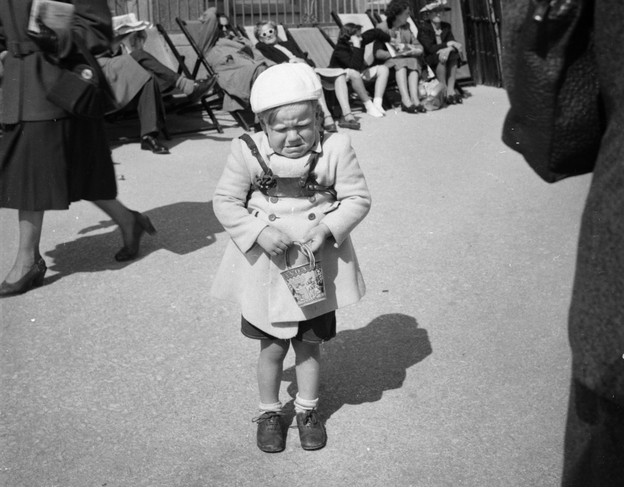 Imagine the tantrums they'll throw, when they find out they're not welcome. This picture taken, circa 1952 shows little Peter Moore throwing a temper tantrum while on a visit to Bournemouth, Dorset.