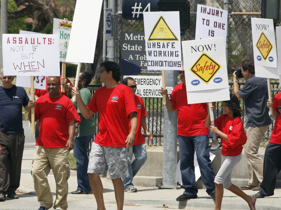 Metropolitan State Hospital employees and supporters gather outside the gates of the hospital in Norwalk, Calif., earlier this month to protest repeated assaults at the hands of mental patients and what they call dangerous working conditions.