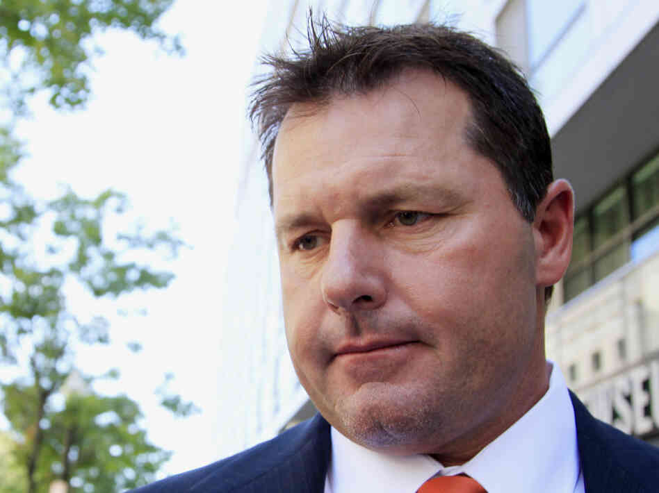 Former Major League Baseball pitcher Roger Clemens leaves federal court in Washington on Thursday after the judge declared a mistrial in his perjury trial.