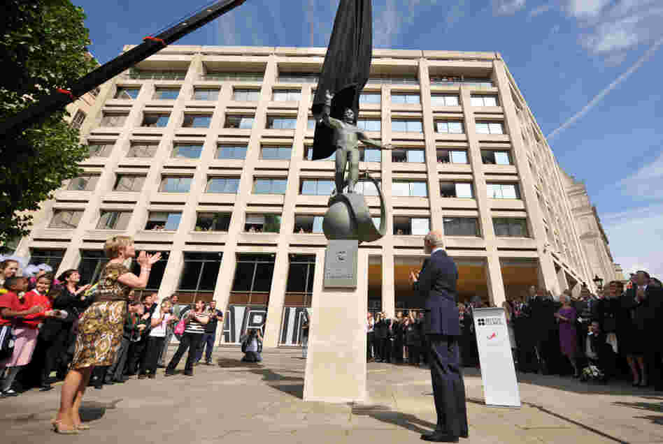 A statue of Russian cosmonaut Yuri Gagarin is unveiled in London on Thursday, as Gagarin's daughter, Elena (left) and Britain's Prince Michael of Kent look on. Gagarin became the first man in space April 12, 1961, as he orbited Earth.