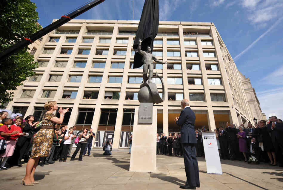A statue of Russian cosmonaut Yuri Gagarin is unveiled in London on Thursday, as Gagarin's daughter, Elena (left) and Britain's Prince Michael of Kent look on. Gagarin became the first man in space April 12, 1961, as he orbited Earth.