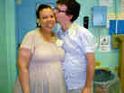 Lateefah and her husband, Frank, during a visit to his classroom earlier this month. It took them a while to find their OB, but they're thrilled with their choice.