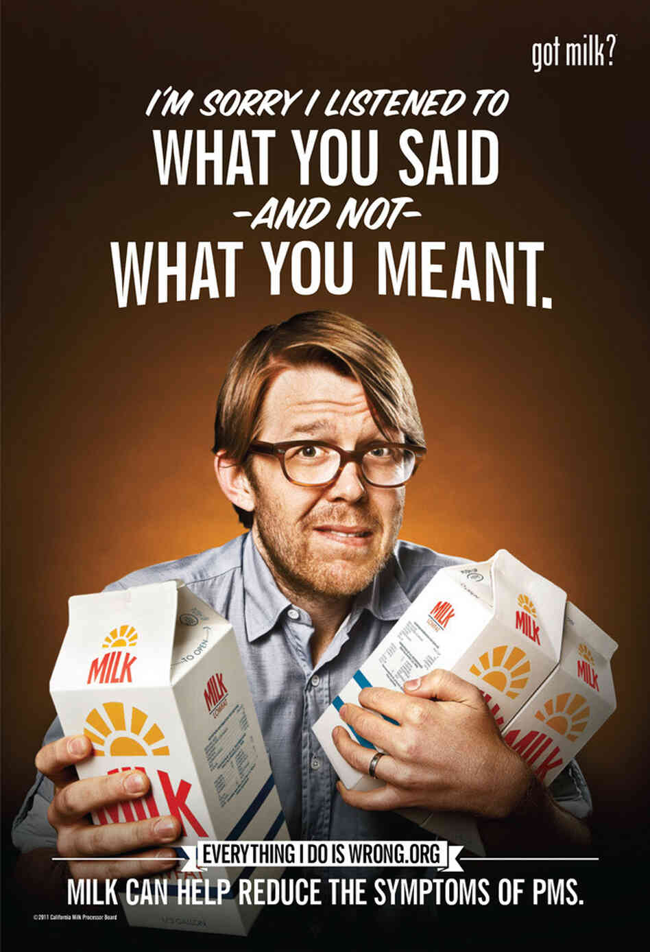 In one piece from the edgy campaign, a henpecked husband cowers with cartons of milk in his arms.