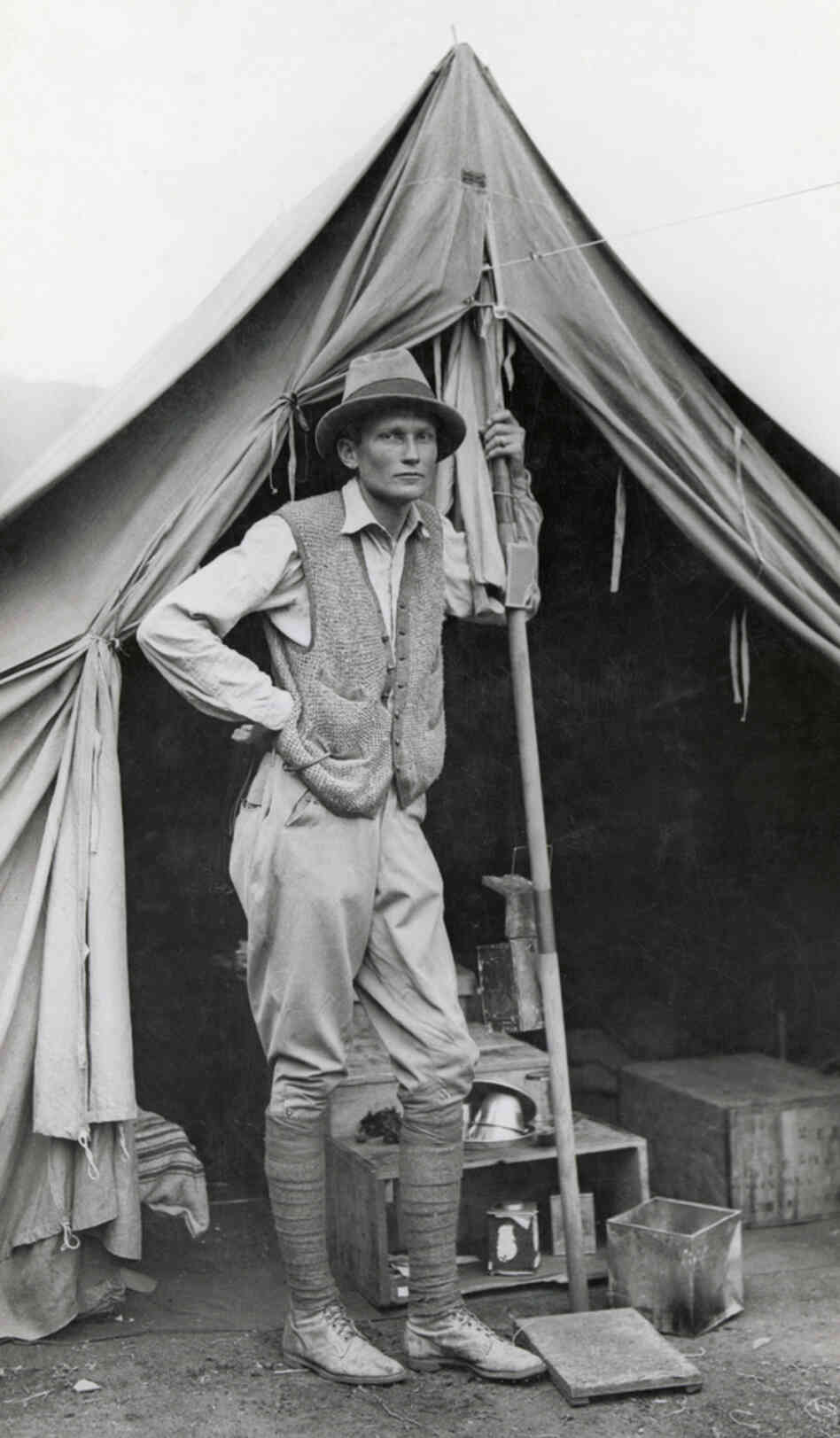 Hiram Bingham stands outside his tent during the 1912 expedition.