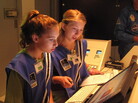 Seventh-graders Sophie Maloro (left) and Unity Bowling "fly" a mission to Mars, part of a summer program at the MathScience Innovation Center in Richmond, Va. Seventh-graders Sophie Maloro (left) and Unity Bowling "fly" a mission to Mars, part of a summer program at the MathScience Innovation Center in Richmond, Va.